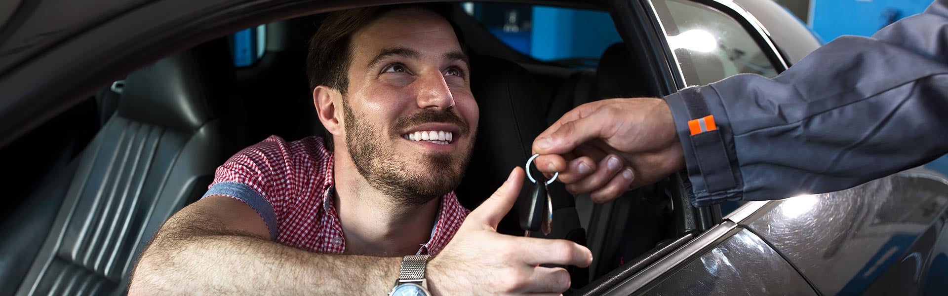 Happy customer getting keys to their new vehicle