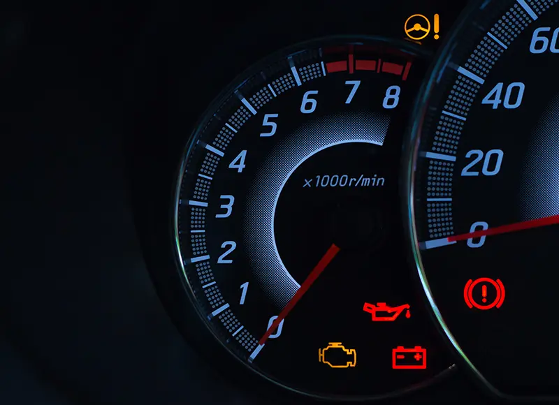 Vehicle dashboard with warning light